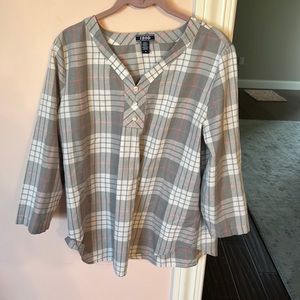Gray white and pink women blouse.